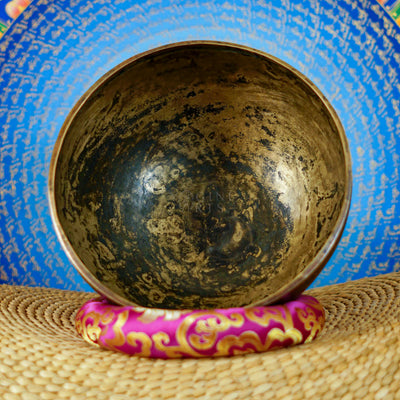 Semi antique singing bowl with intricate flower vase and floral engraving, handcrafted in Nepal