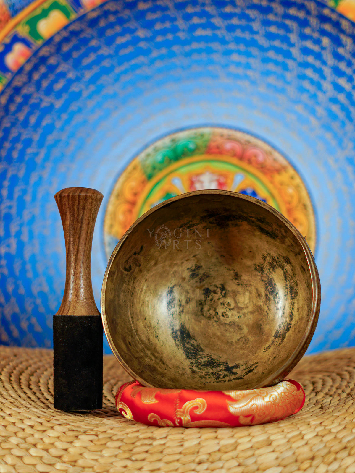 Semi antique handmade singing bowl with intricate floral engravings and aged bronze finish from Nepal