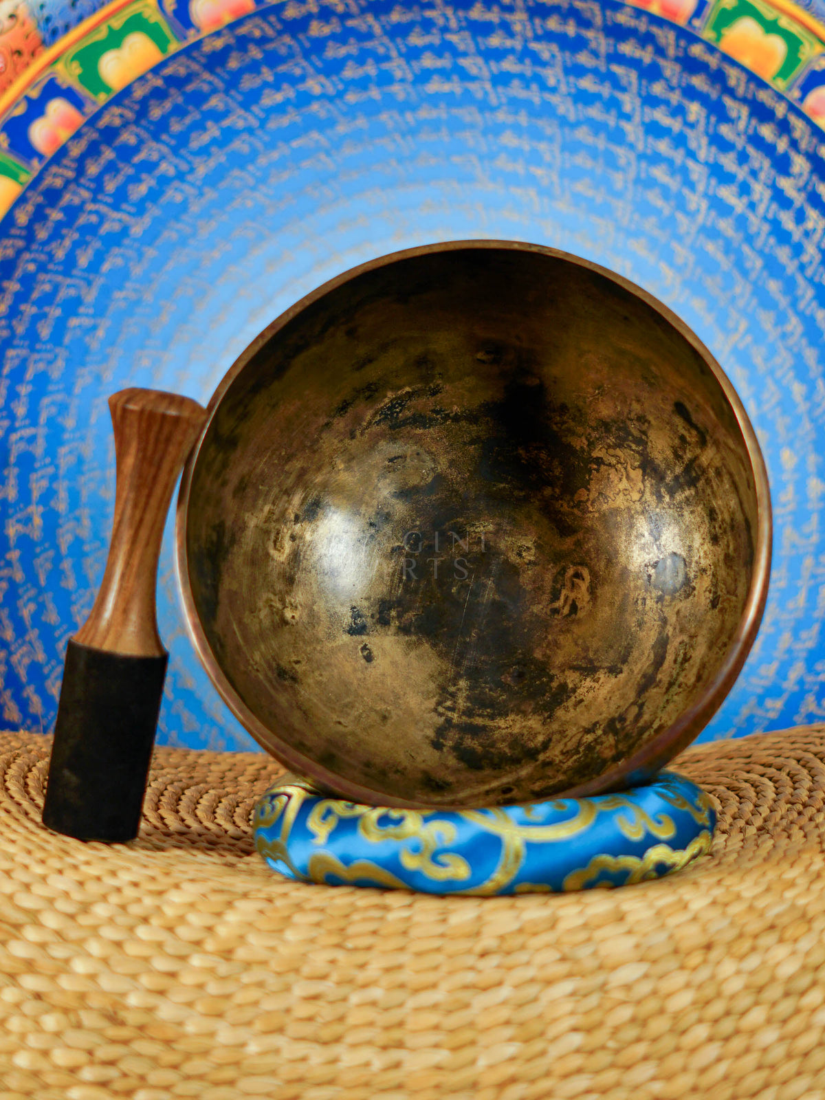 Semi antique handmade singing bowl with intricate floral panel engraving and aged bronze finish from Nepal