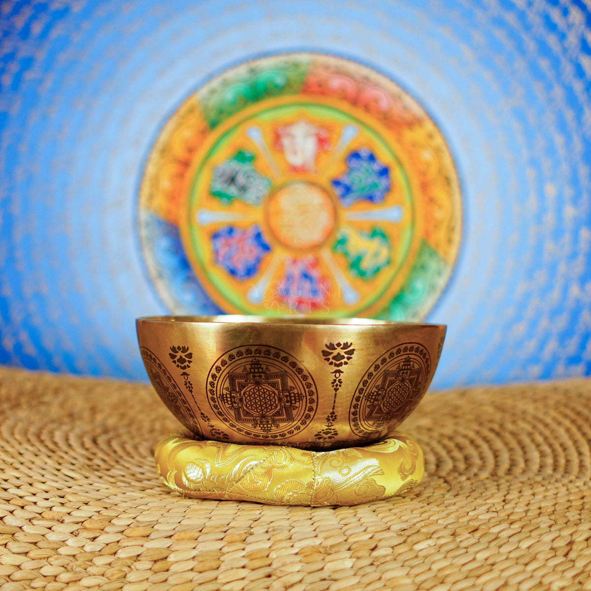 Chakra Mandala singing bowl with sacred geometry, meditation figure, and detailed engraved Buddhist-inspired artwork