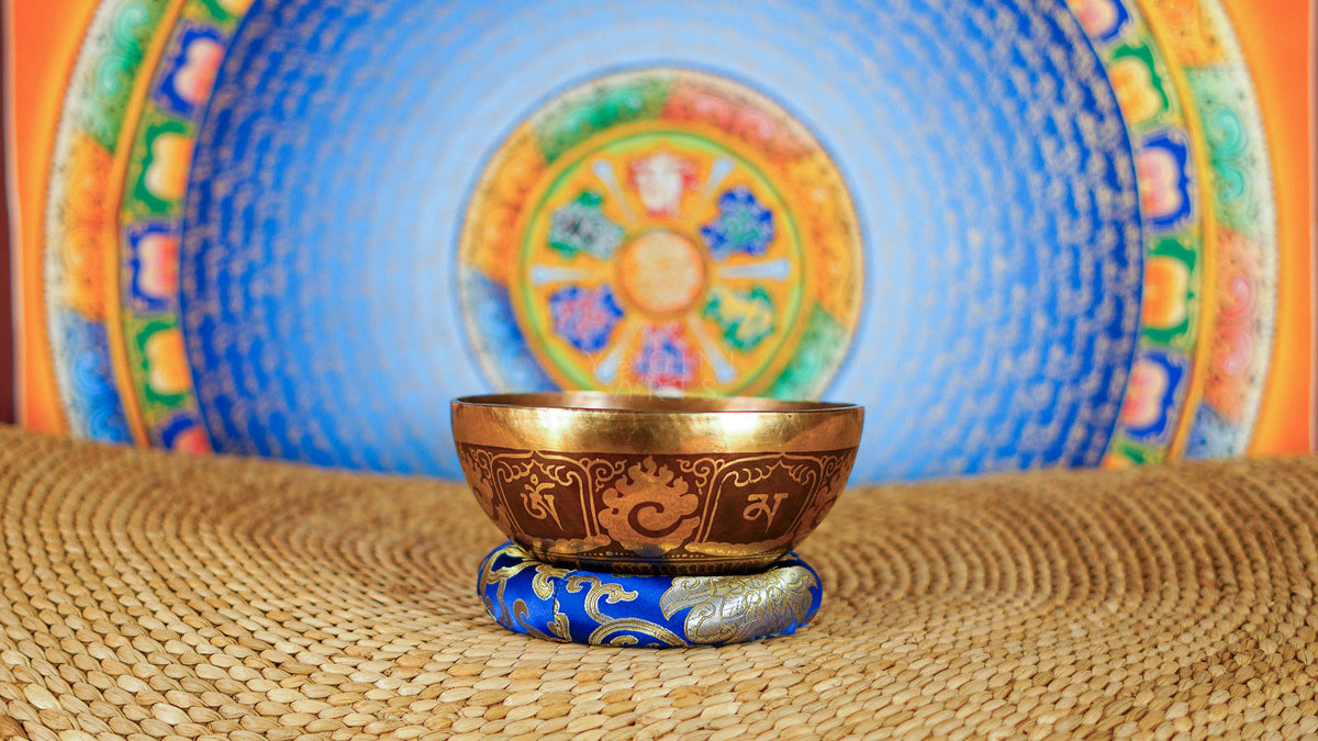 Cosmos singing bowl with intricate floral mandala engraving and traditional Tibetan-inspired artwork from Nepal