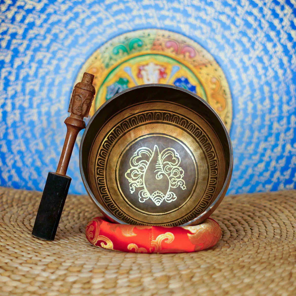 Conch singing bowl with traditional Buddhist conch symbolism and detailed engraved Nepalese craftsmanship