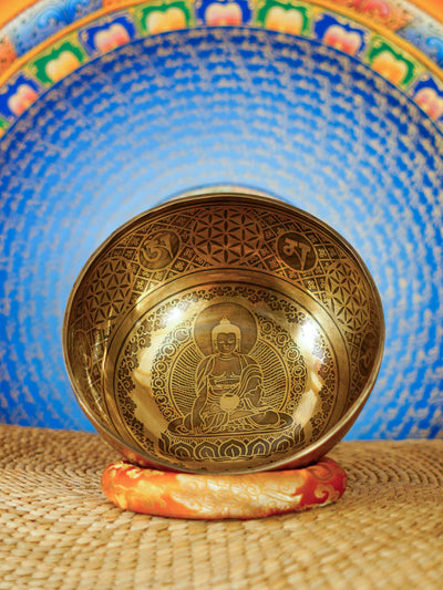 Handmade Nepal singing bowl with Shakyamuni Buddha carved on the outside, for meditation and sound healing