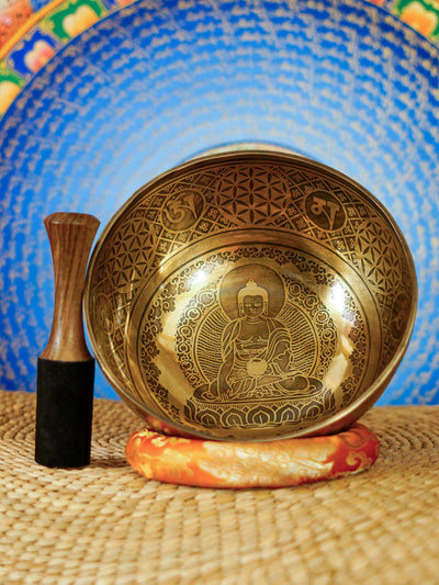Handmade Nepal singing bowl with Shakyamuni Buddha carved on the outside, for meditation and sound healing
