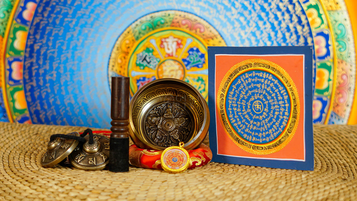 Pancha Buddha singing bowl set with tingsha, suede mallet, cushion, Buddhist mantra artwork and pendant