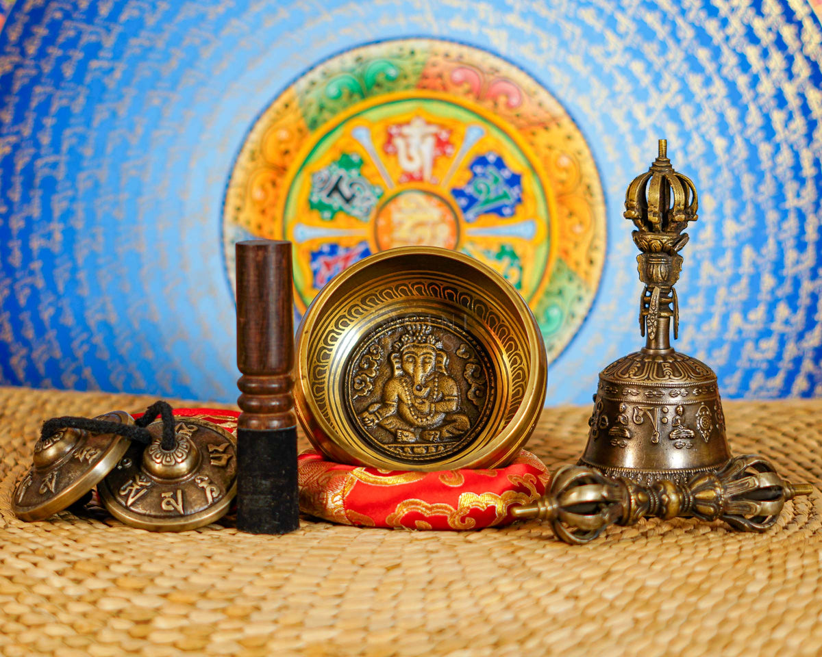 Complete Ganesha singing bowl set with tingsha, suede mallet, cushion, bell and vajra