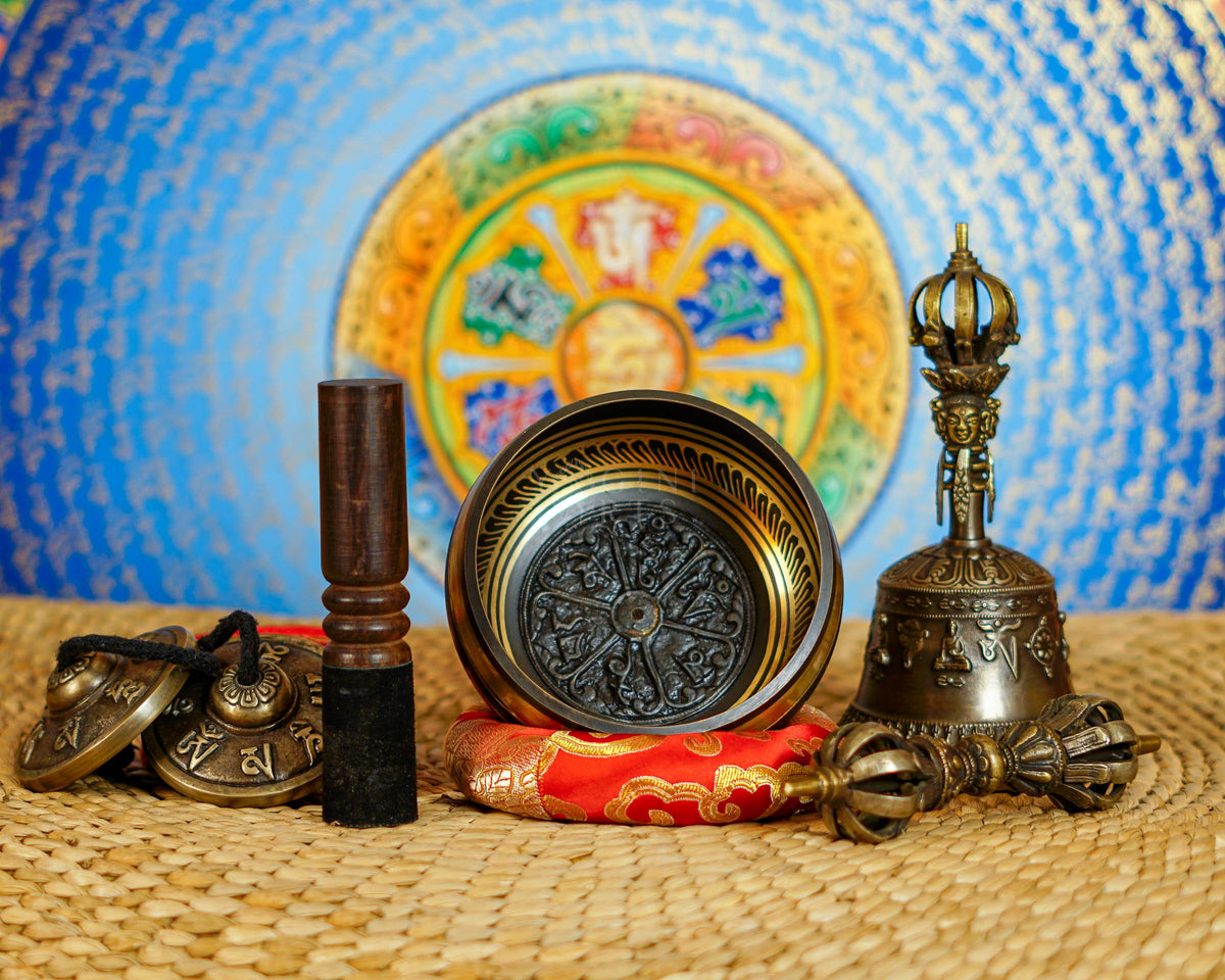 Complete mantra singing bowl set with tingsha, suede mallet, cushion, bell and vajra