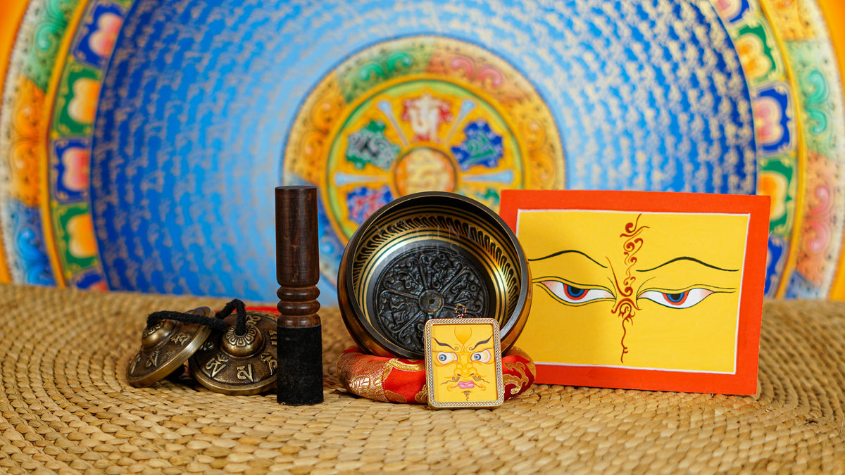 Mantra singing bowl set with tingsha, suede mallet, cushion, Buddhist artwork and pendant