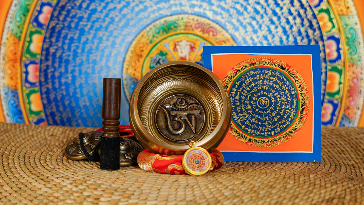 Mantra singing bowl set with Ashtamangala tingsha, suede mallet, cushion and Buddhist artwork