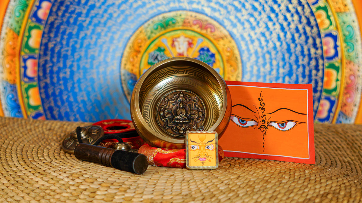Buddha Mandala Bronze Singing Bowl with raised seated Buddha design and traditional engraved patterns