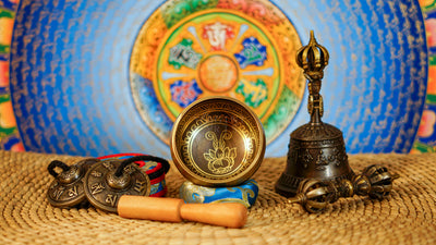 Lotus design singing bowl set with Ashtamangala tingsha, wooden mallet, cushion and Buddhist devotional accessories from Nepal