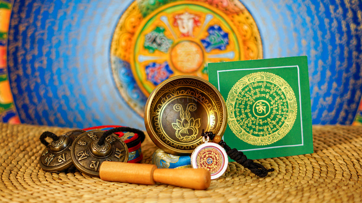 Complete lotus singing bowl ritual set with Ashtamangala tingsha, Buddhist bell, vajra, wooden mallet and meditation accessories from Nepal