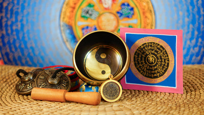 Yin Yang singing bowl meditation set with Ashtamangala tingsha, wooden mallet, cushion and Buddhist devotional accessories from Nepal