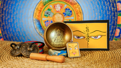 Buddha design singing bowl meditation set with Ashtamangala tingsha, wooden mallet, cushion and Buddhist devotional accessories from Nepal