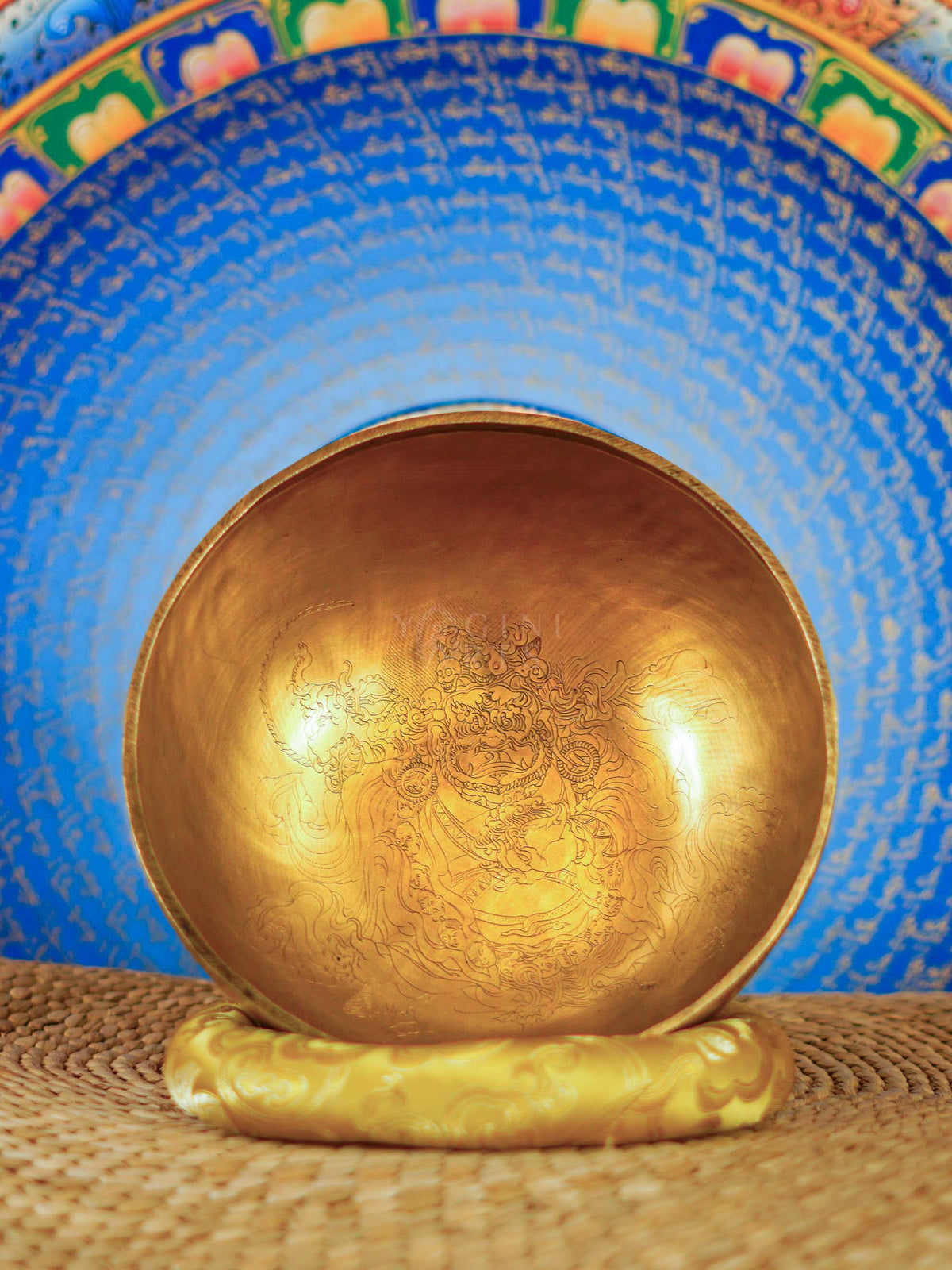 Interior view of Mahakala engraved Tibetan singing bowl with detailed artwork