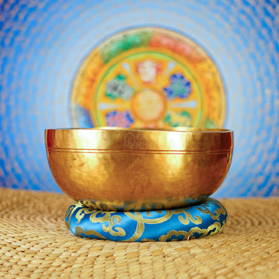 Asthamangal Nepalese singing bowl with Eight Auspicious Symbols and ornate engraving