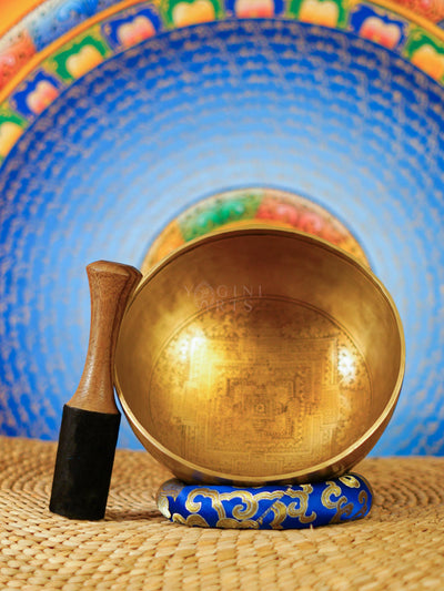 Interior view of a handcrafted Kalchakra Mandala singing bowl showing intricate geometric engraving