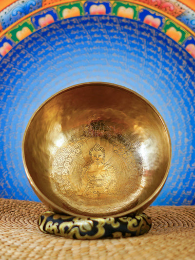 Handcrafted Buddha Singing Bowl from Nepal with engraved Buddha design for meditation and mindfulness