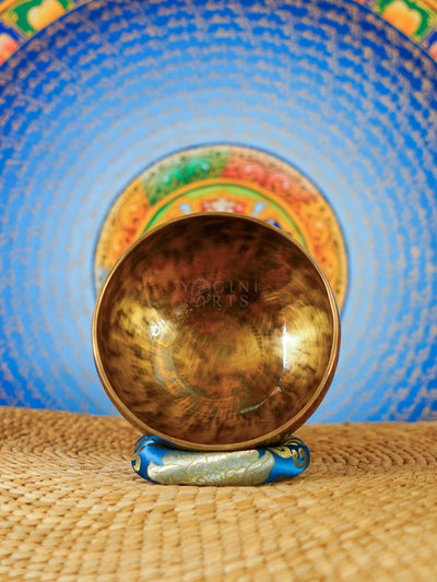 Handmade traditional Tibetan singing bowl from Nepal with cushion and mallet for meditation and mindfulness