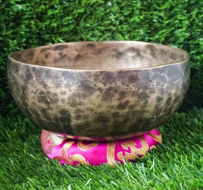 Semi-antique singing bowl with aged surface, ideal for meditation and relaxation