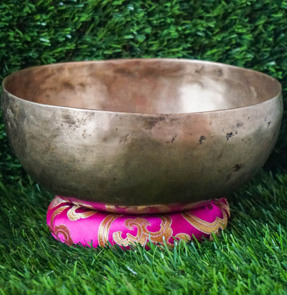 Semi-antique Singing Bowl handcrafted in Nepal with aged patina, delivering deep resonant tones for meditation, mindfulness, and spiritual practice.