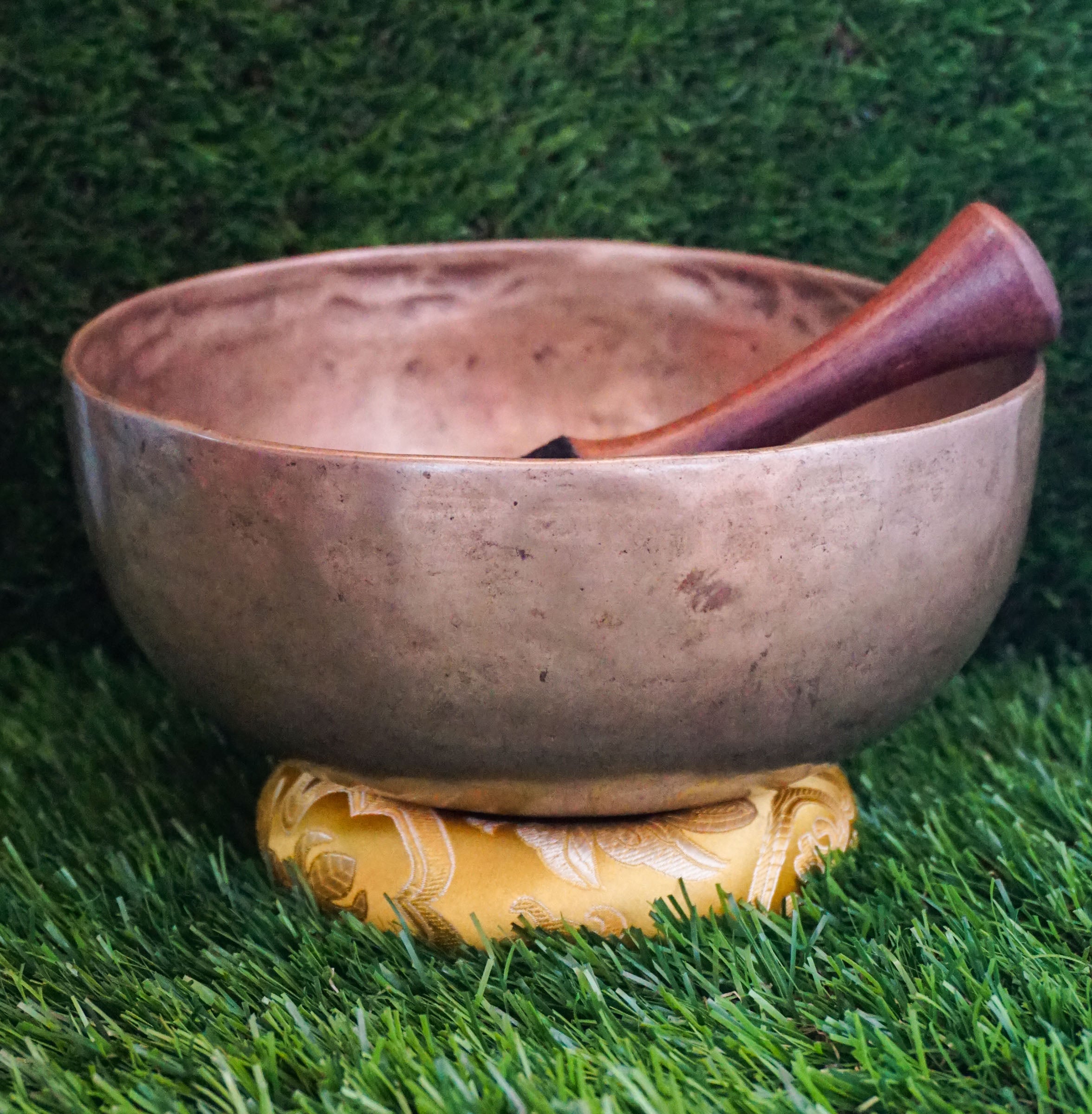 Semi-antique Singing Bowl handcrafted in Nepal with aged patina, producing deep resonant tones for meditation and healing.