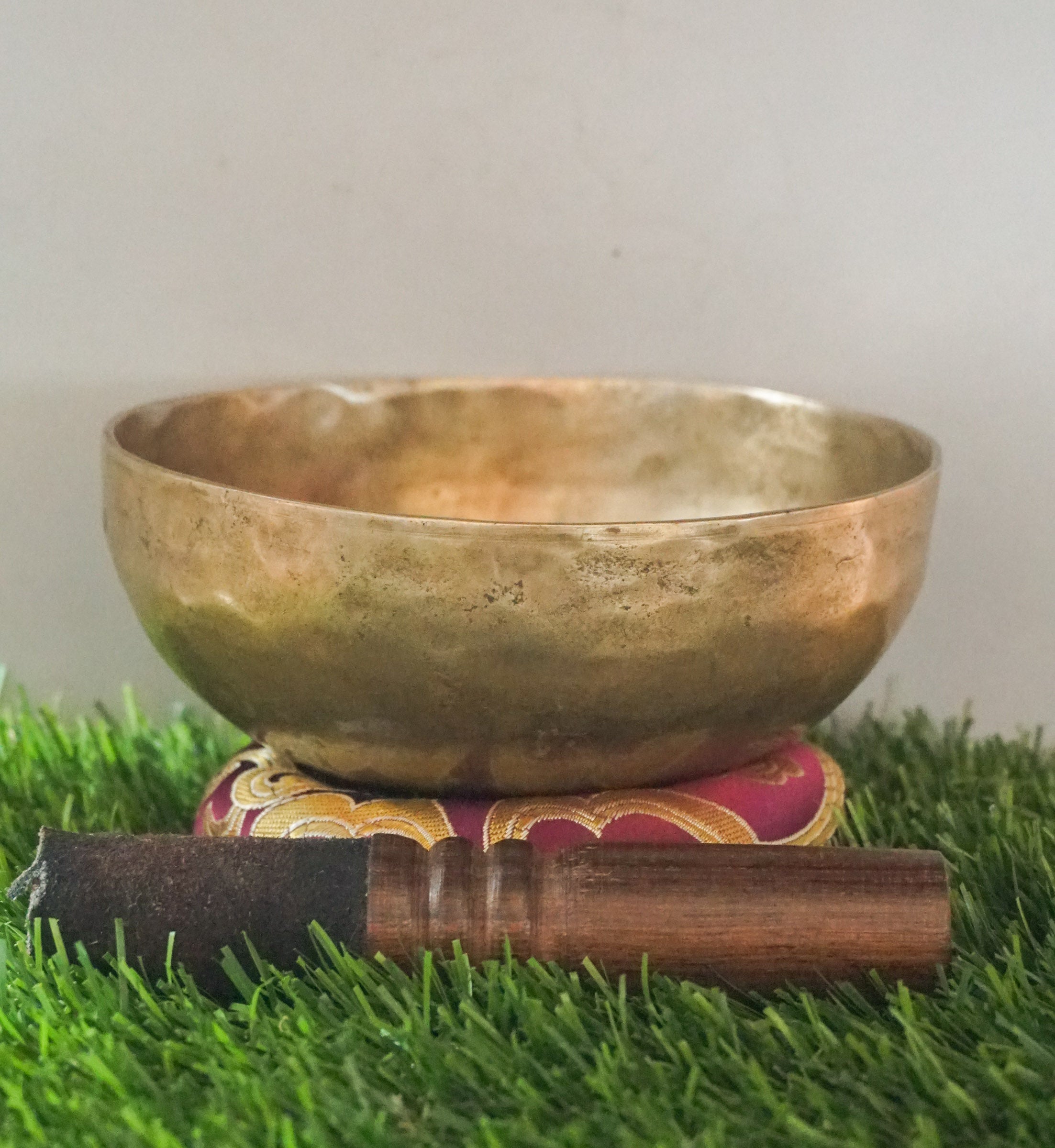 Semi-antique Singing Bowl handcrafted in Nepal with aged patina, producing deep resonant tones for meditation and healing.