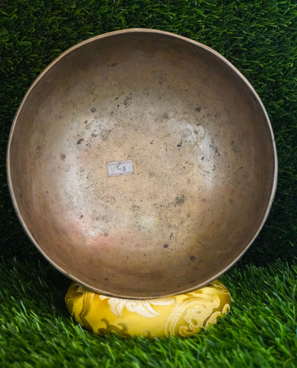 Semi-antique Singing Bowl handcrafted in Nepal with aged patina, producing deep resonant tones for meditation and healing.