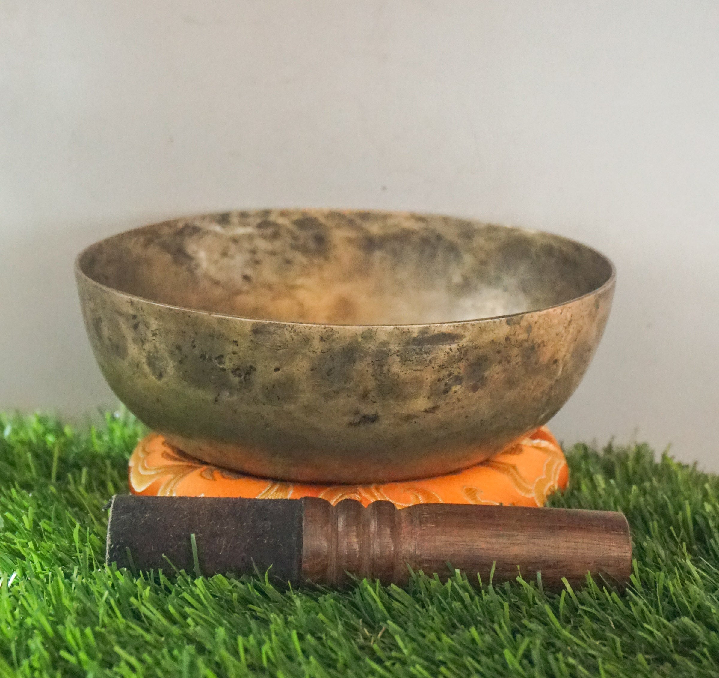 Semi-antique singing bowl handcrafted in Nepal with aged finish for meditation and healing.
