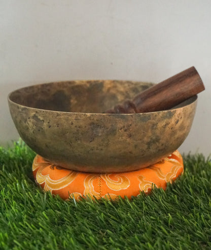 Semi-antique singing bowl handcrafted in Nepal with aged finish for meditation and healing.