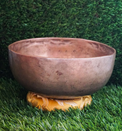 Semi-antique Singing Bowl handcrafted in Nepal with aged patina, producing deep resonant tones for meditation and healing.