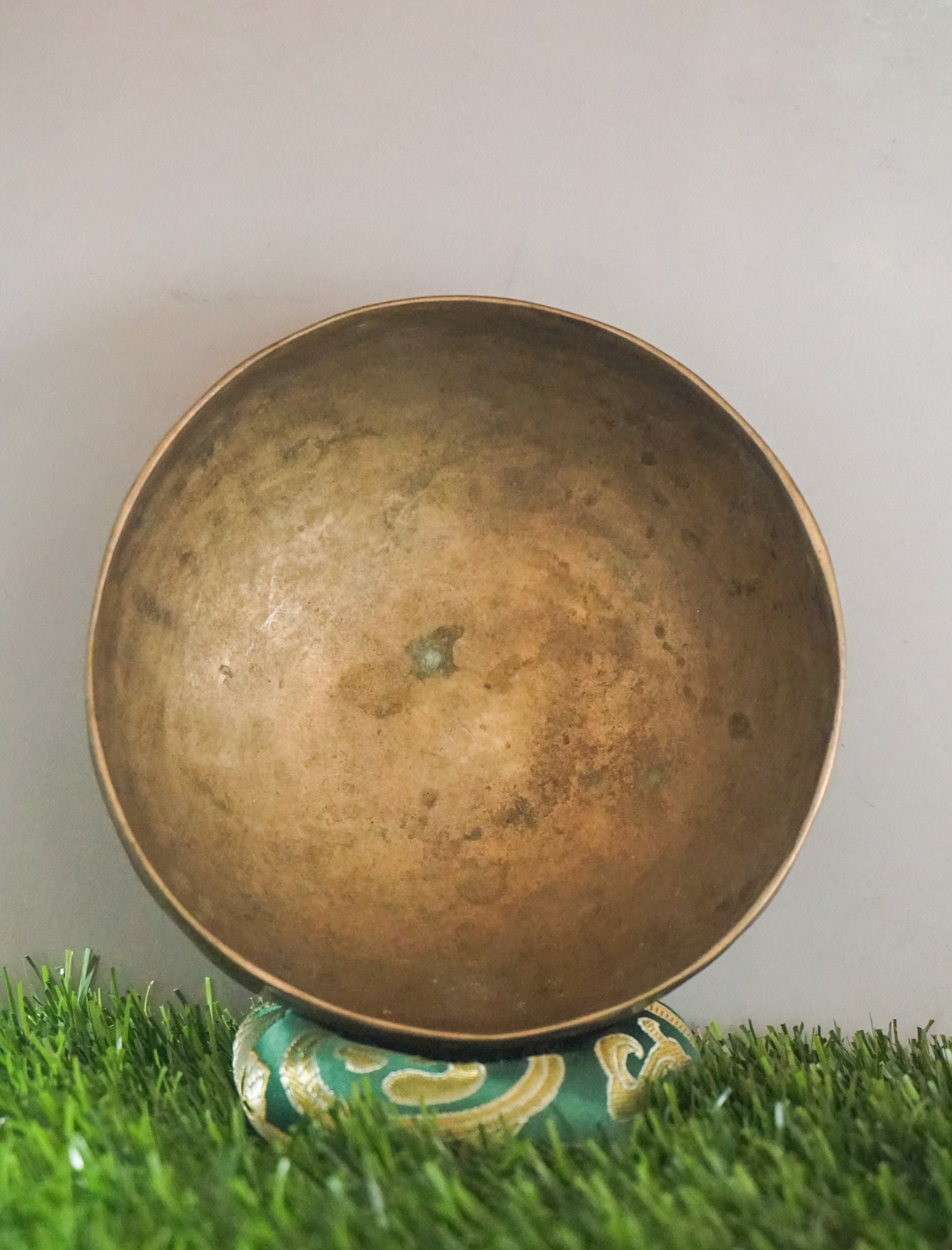Semi-antique handmade Tibetan singing bowl with simple design, crafted in Nepal for meditation, Buddhist art, and sound healing.