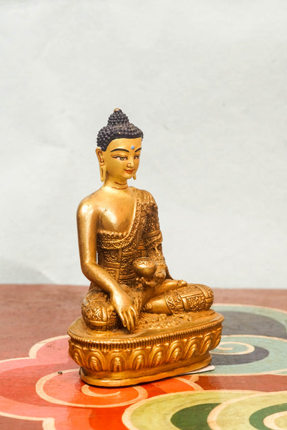 Shakyamuni Buddha statue symbolizing awakening, compassion, and clarity. Made by skilled Himalayan artisans, it’s perfect for meditation altars or as a meaningful spiritual gift.