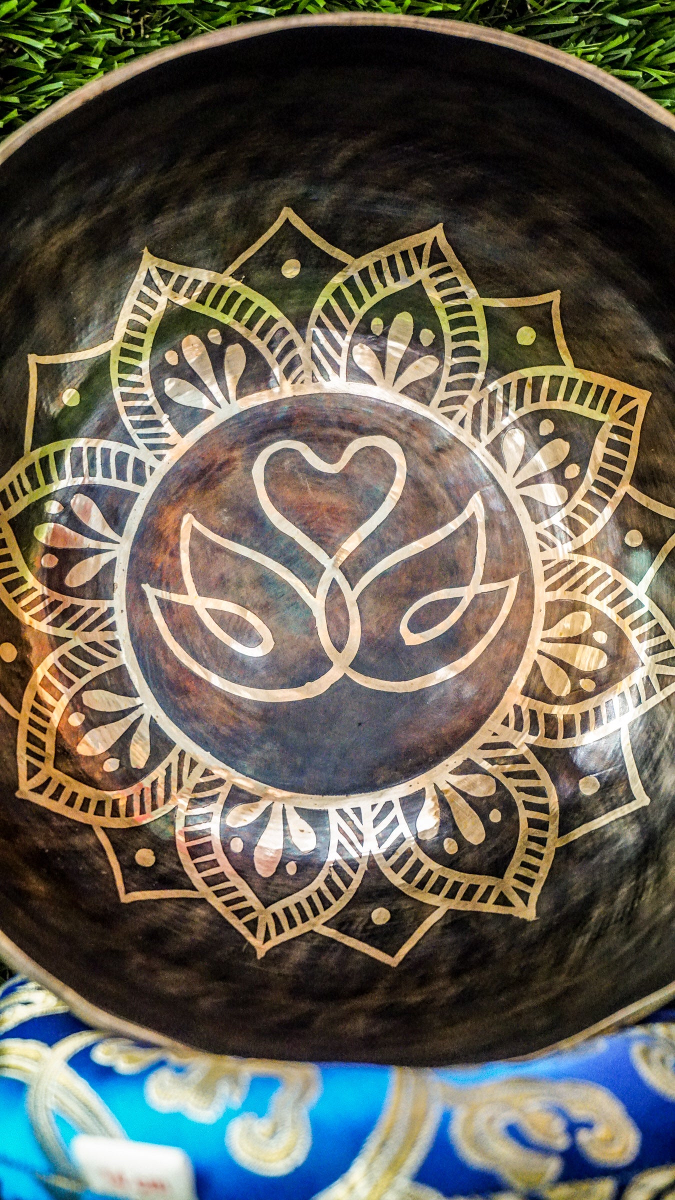 The Swan Singing Bowl features two swans forming a heart within a flower mandala, symbolizing love, unity, and peace. Matching mandala patterns wrap around the bowl, adding beauty and balance. Its soothing sound creates a calming atmosphere perfect for meditation, reflection, or daily relaxation.