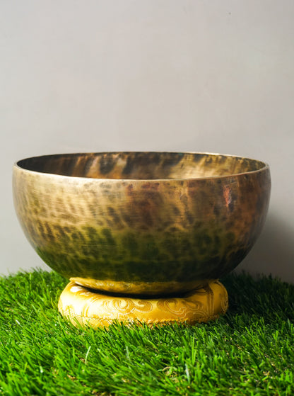 Hand-hammered Tiger Style Tibetan Singing Bowl from Kathmandu Nepal with tiger stripe patterns, used in Buddhist meditation, sound healing, and Himalayan mindfulness practice.