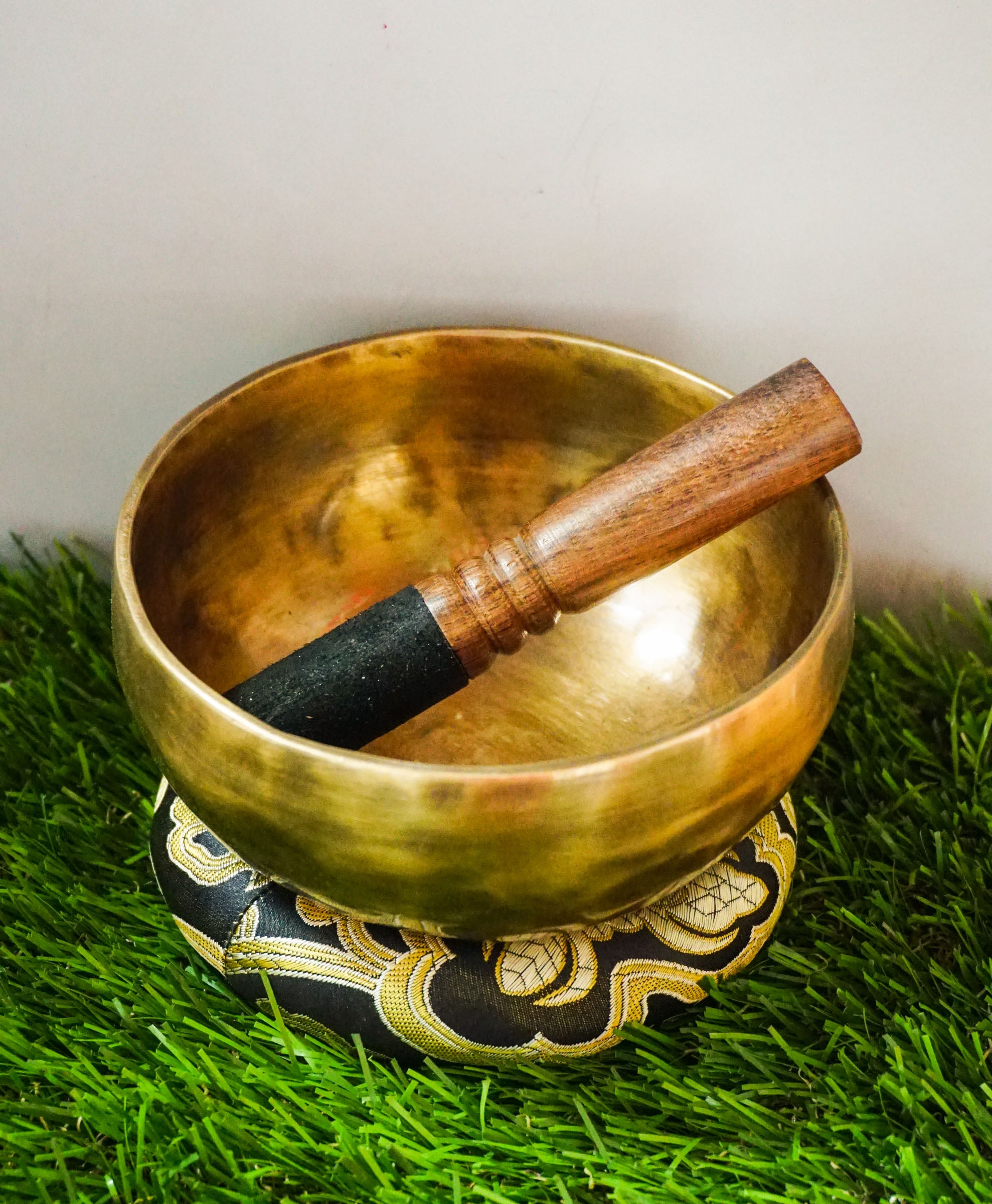 Hand-hammered Tiger Style Tibetan Singing Bowl from Kathmandu Nepal with tiger stripe patterns, used in Buddhist meditation, sound healing, and Himalayan mindfulness practice.