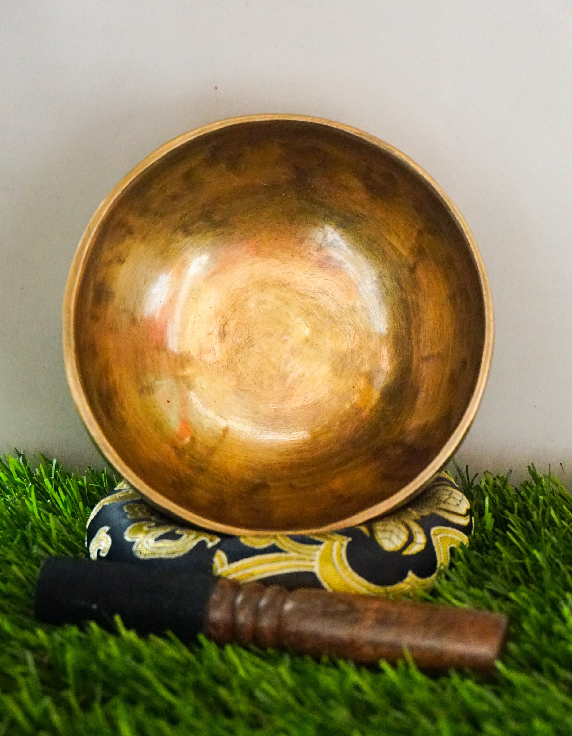 Hand-hammered Tiger Style Tibetan Singing Bowl from Kathmandu Nepal with tiger stripe patterns, used in Buddhist meditation, sound healing, and Himalayan mindfulness practice.