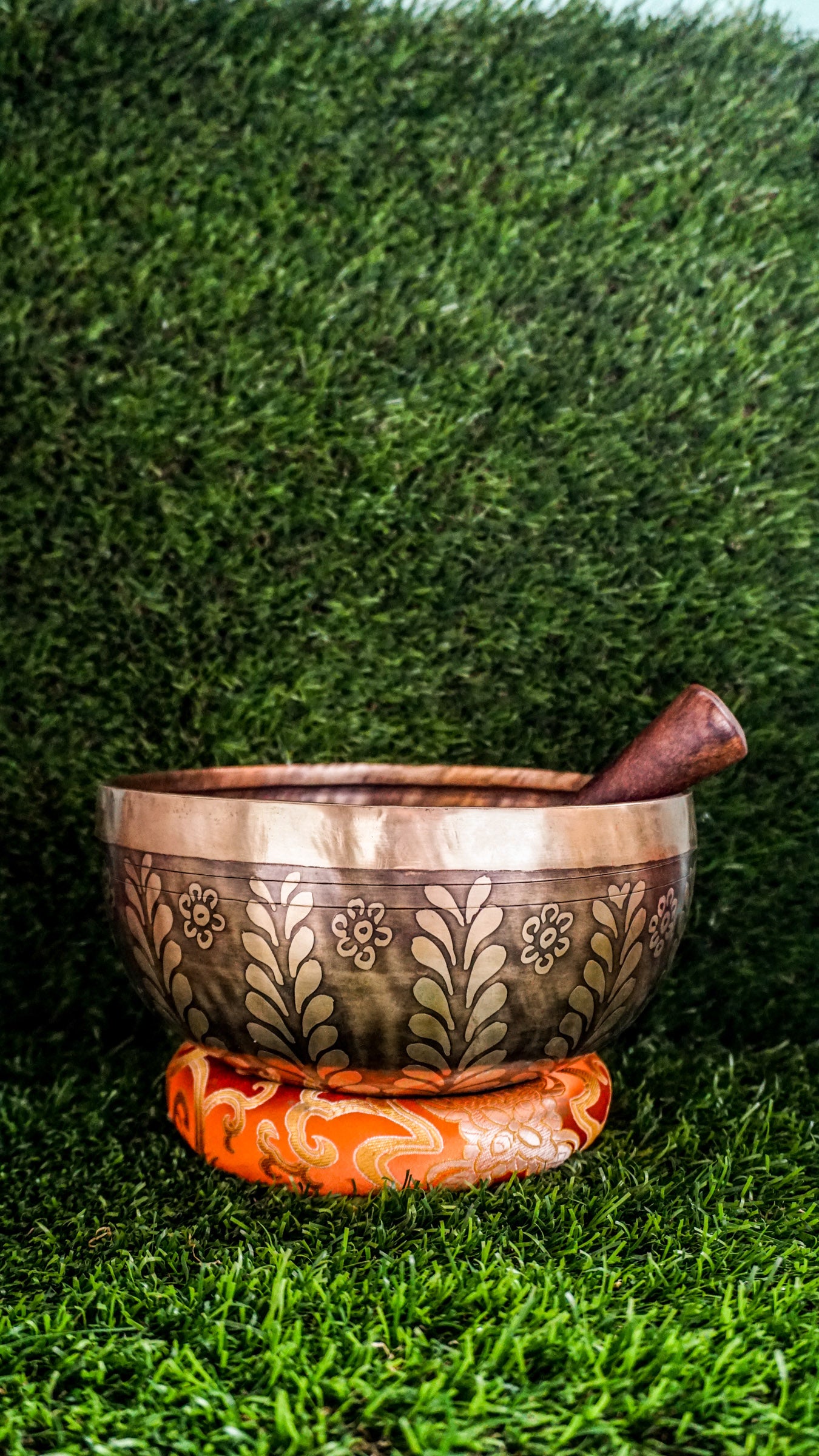The Tree Singing Bowl features a graceful tree symbol at its center, representing growth, balance, and grounded strength. Floral patterns on the outside add calm and beauty. Its deep and soothing sound supports relaxation, focus, and connection, making it ideal for meditation or creating a peaceful space.