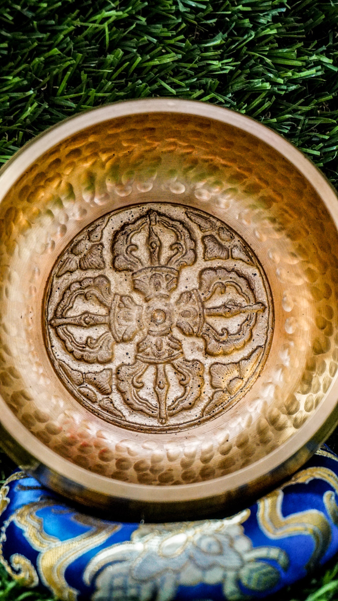
The Dotted Vajra Singing Bowl brings steady, grounding energy to your space. Inside rests the Vajra symbol, representing spiritual power, truth, and balance between compassion and wisdom. The bowl’s subtle dotted texture keeps the design natural and simple, letting its clear, calming tones shine. Perfect for meditation or intention setting, it offers quiet strength and helps you reset and realign with ease.