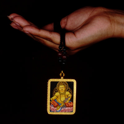 Yellow Zambala Ghau Thangka Pendant – Hand-Painted Newari Prosperity Amulet
