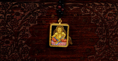 Yellow Zambala Ghau Thangka Pendant – Hand-Painted Newari Prosperity Amulet