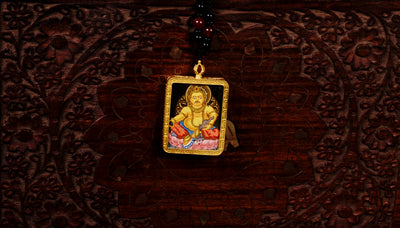 Yellow Zambala Ghau Thangka Pendant – Hand-Painted Newari Prosperity Amulet