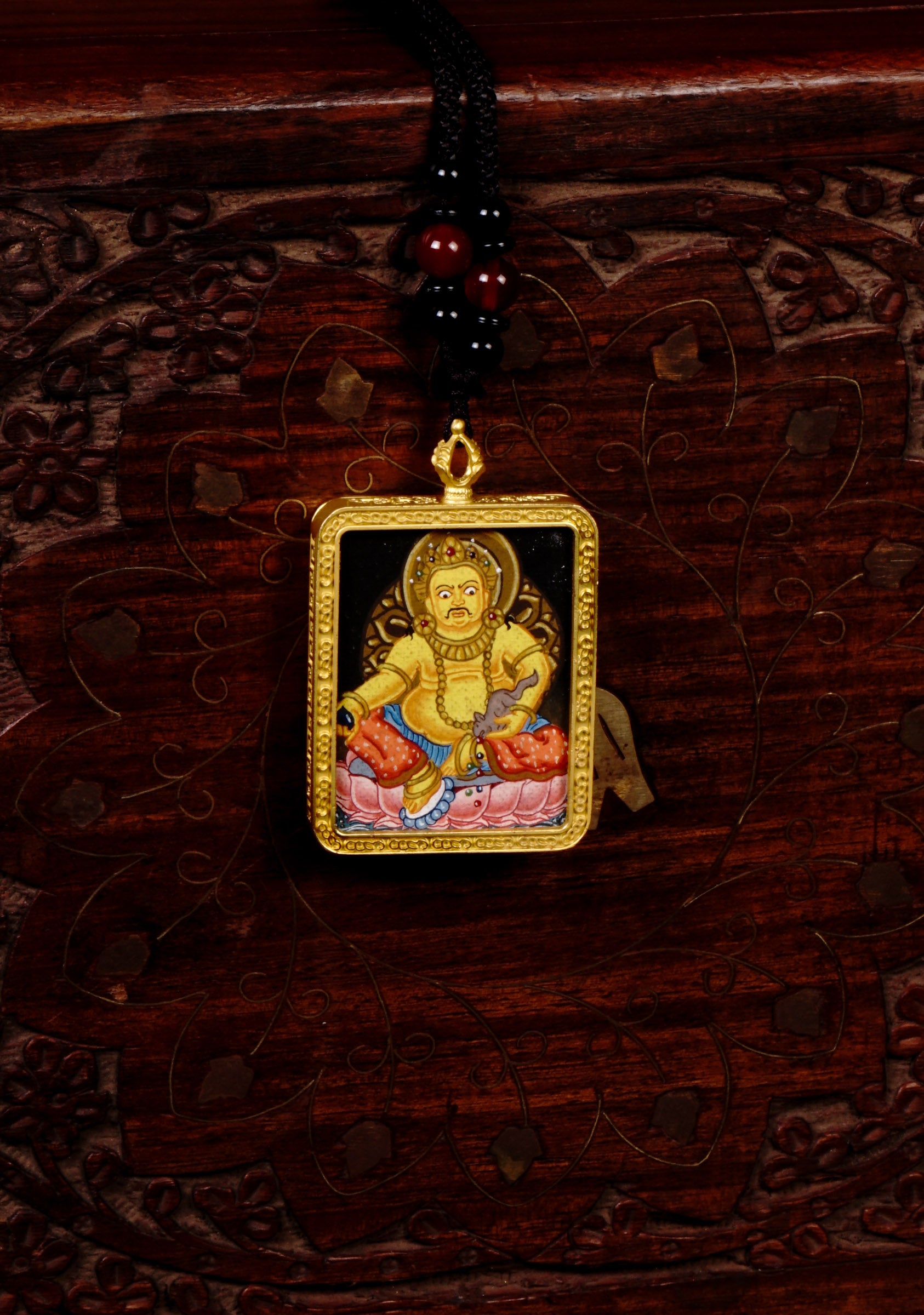 Yellow Zambala Ghau Thangka Pendant – Hand-Painted Newari Prosperity Amulet