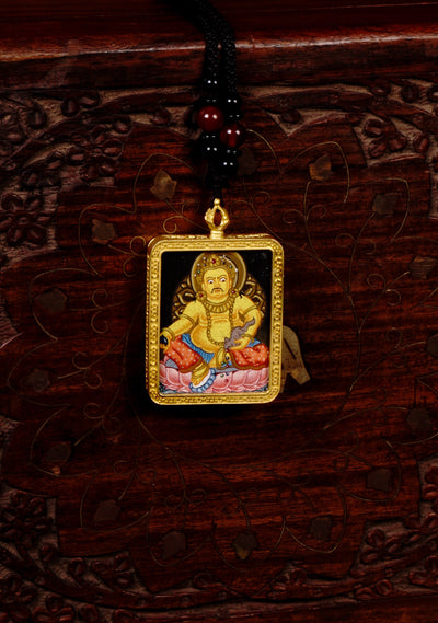 Yellow Zambala Ghau Thangka Pendant – Hand-Painted Newari Prosperity Amulet