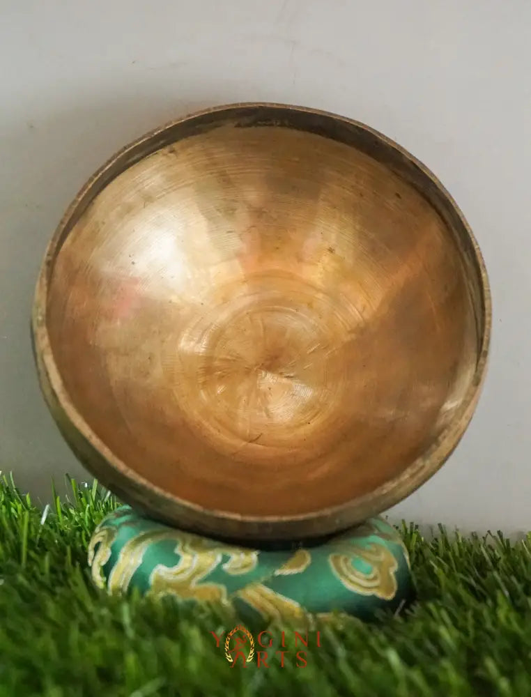 Semi-antique handmade Tibetan singing bowl with simple design, crafted in Nepal for meditation, Buddhist art, and sound healing.