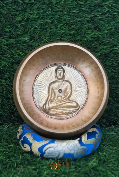 Invite mindfulness and calm with our handcrafted Dotted Buddha Singing Bowl. Featuring an engraved Buddha surrounded by a dotted mandala symbolizing stillness and spiritual balance, this bowl reminds you to stay present. Traditional mantras circle the rim, adding protection and spiritual energy. Handcrafted by skilled Himalayan artisans, it produces soothing tones that quiet the mind and support meditation, breathwork, and daily mindfulness practice.








