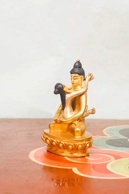 Statue of Buddha Shakti, depicting a serene Buddha figure in a meditative pose, adorned with symbolic ornaments and traditional attire.