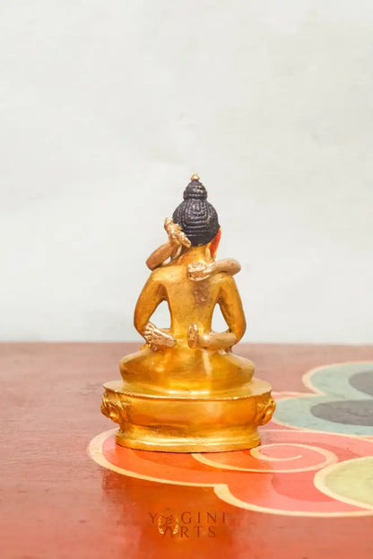 Statue of Buddha Shakti, depicting a serene Buddha figure in a meditative pose, adorned with symbolic ornaments and traditional attire.