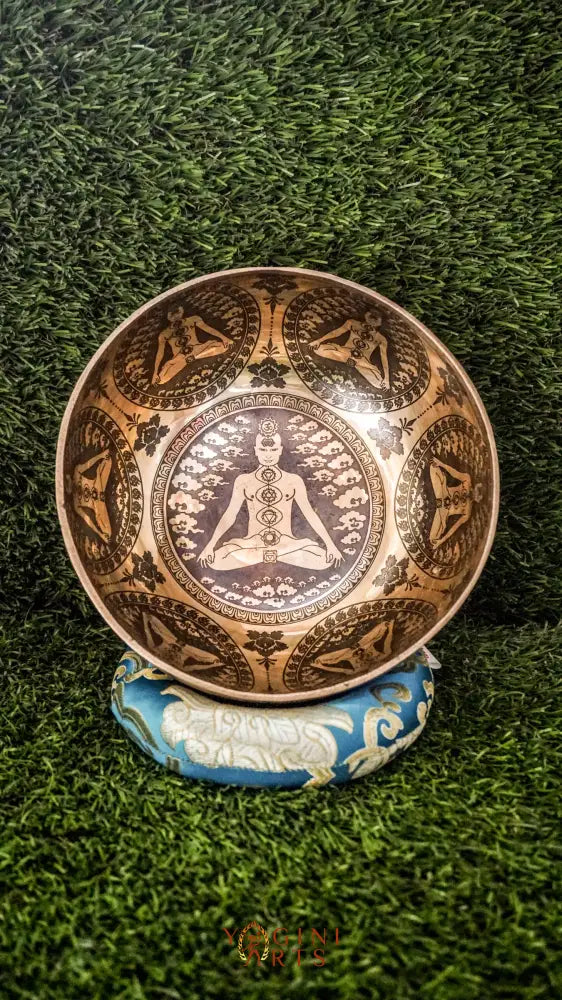 Awaken and balance your inner energies with our handcrafted Chakra Manab Singing Bowl. Featuring detailed engravings of the seven chakras and sacred Sanskrit mantras, this bowl supports spiritual growth, healing, and protection. Hand-hammered by skilled Himalayan artisans, it produces rich, clear tones that help clear energy blockages and promote chakra alignment. Ideal for meditation, sound healing, and holistic wellness, it is a meaningful companion on your spiritual journey.