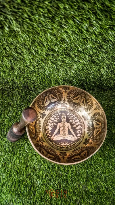 Awaken and balance your inner energies with our handcrafted Chakra Manab Singing Bowl. Featuring detailed engravings of the seven chakras and sacred Sanskrit mantras, this bowl supports spiritual growth, healing, and protection. Hand-hammered by skilled Himalayan artisans, it produces rich, clear tones that help clear energy blockages and promote chakra alignment. Ideal for meditation, sound healing, and holistic wellness, it is a meaningful companion on your spiritual journey.